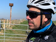 Load image into Gallery viewer, cyclist-wearing-gb-viz-vigo-bifocal-sports-sunglasses-side-view
